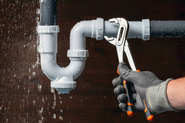 Professional Plumbing technician working in Baltic, CT
